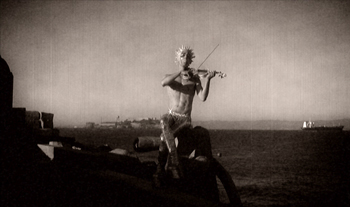 Paul Festa as Stringendo in Paul Festa's silent-film comedy The Glitter Emergency